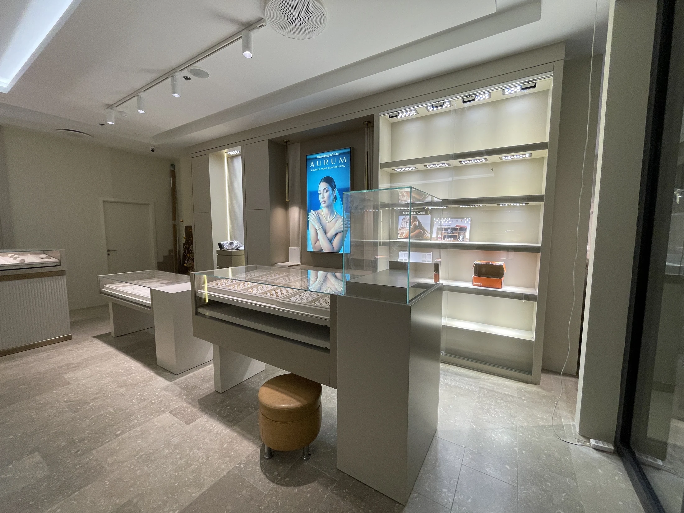 Bespoke jewellery display counters and illuminated shelving at AURUM Copenhagen